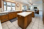 This well equipped kitchen with open floor plan  will keep the whole group connected.